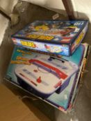 A Lego Builder Xtreme and a Lightening Action Air Slammers game, boxed