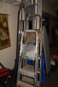 Four aluminium ladders
