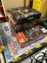 A collection of TV board games and a Joe 90 annual, to include: - Robot Wars: The Game - Dragon's