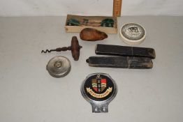 Box of mixed items to include car badge, darts etc