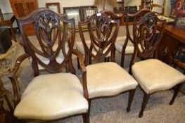 Set of six Georgian style mahogany shield back dining chairs with carved floral decoration