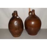 Two brown glazed stoneware flagons, unnamed