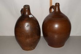 Two brown glazed stoneware flagons, unnamed