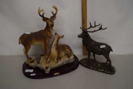 Modern resin model of a pair of deer, together with a further bronze resin model of a stag (2)