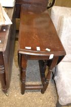 18th Century oak gate leg table raised on turned legs with an oval drop leaf top, 104cm wide