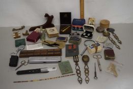 Box of mixed items to include magnifying glass, various cards, card case, novelty camera cigarette