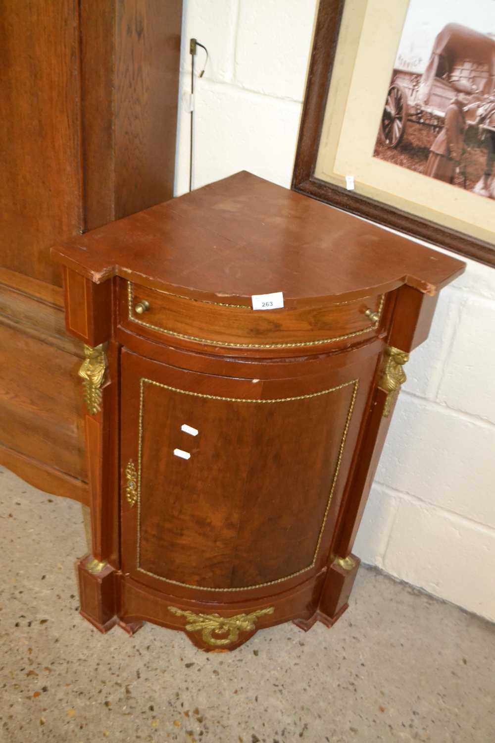 Reproduction brass mounted corner cabinet