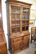 20th century oak bookcase cabinet with glazed top section and drawer and cupboard base