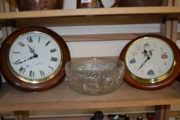 Two wall clocks and a pressed glass bowl