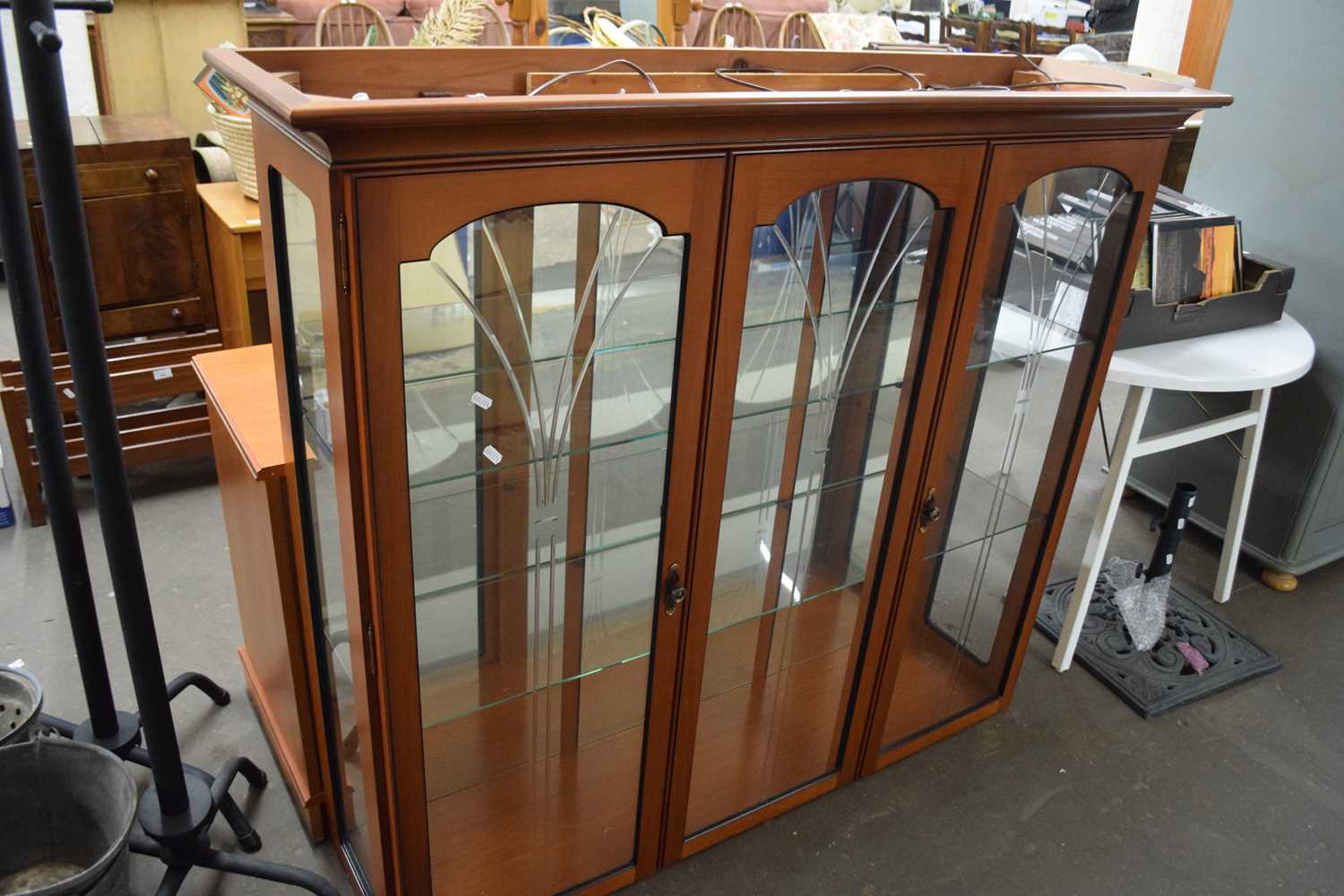 A glazed display cabinet with three glazed doors above, cupboards and drawers below - Image 2 of 2