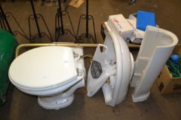 Toilet and cistern with similar wash basin and various hardware