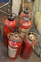 Five vintage fire extinguishers