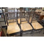 Set of six rush seated dining chairs