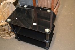 Three-tier black glass TV stand