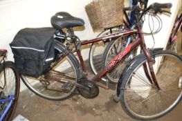 Apollo CX.10 bicycle and panniers