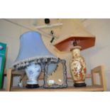 Two table lamps and an easel framed mirror