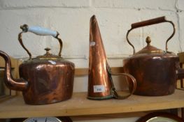 Two copper kettles and a copper measuring jug (3)