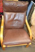 Easy chair with leather cushions