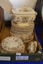 Quantity of brown and gilt decorated dinner wares
