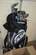 PowaKaddy golf caddy and assorted clubs