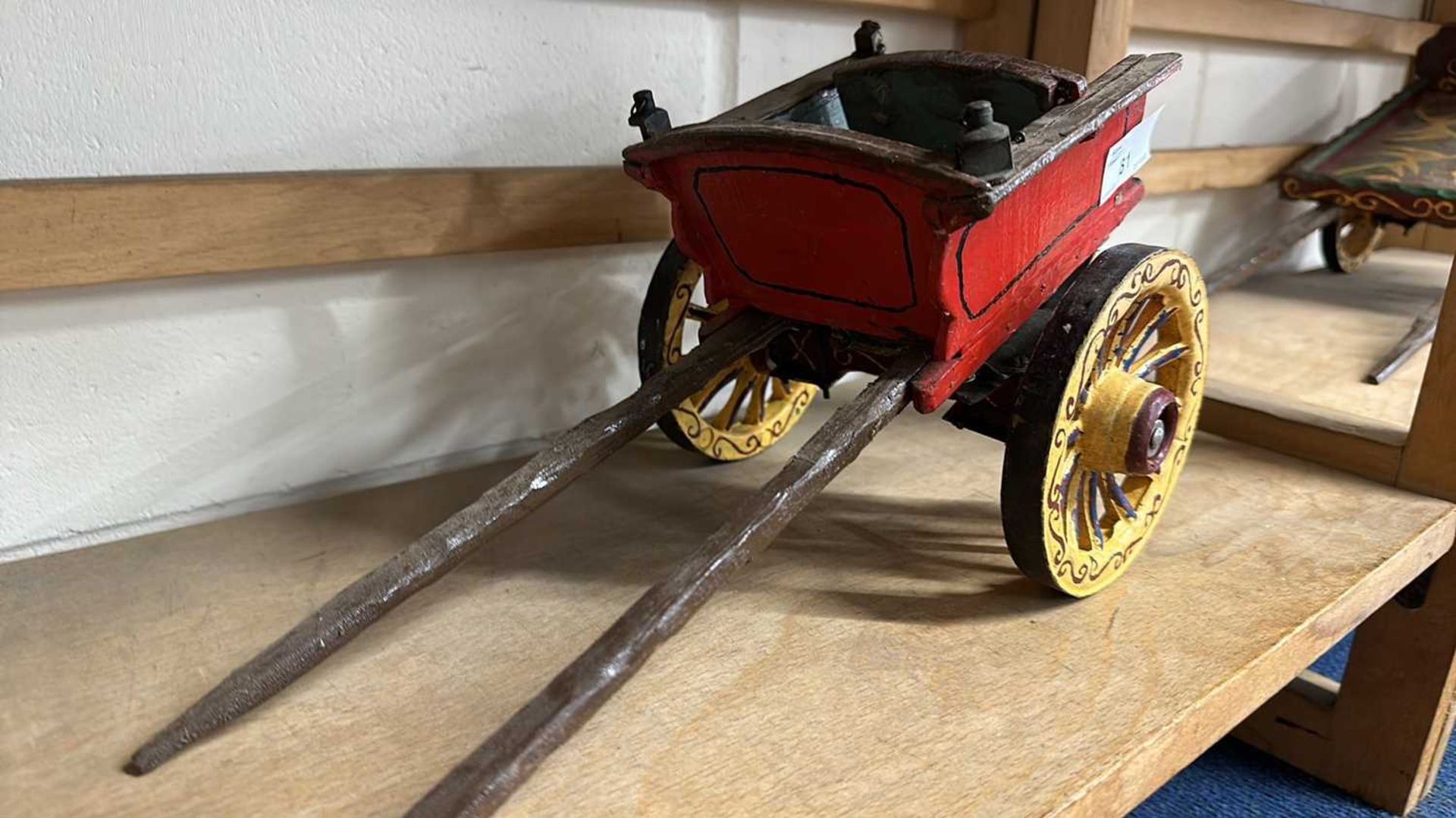 A scratch built model of a small single axle cart, painted in red and yellow, approx 34cm long - Image 2 of 5