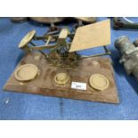 Set of brass postal scales with weights