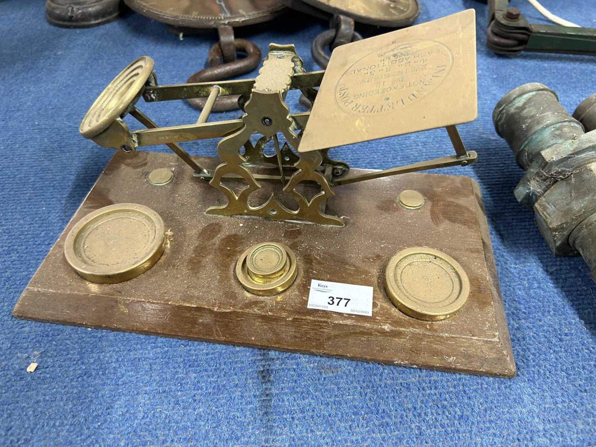 Set of brass postal scales with weights