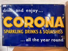 An enamel sign, Drink and Enjoy Corona Sparkling Drinks and Squashes all the Year Round, 76 x 51cm