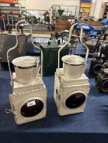 Pair of white painted railway lamps, one marked 'BR (W)', 52cm high