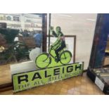 Figural metal sign marked 'Raleigh, the All Seal Bicycle', 50cm high