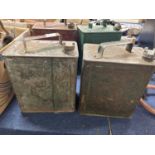 Two vintage petrol cans, one marked 'Shellmex', the other plain