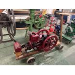 Hired Man stationary engine by The Associated Manufacturies Co, Waterloo, Iowa USA, mounted on a