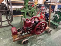 Hired Man stationary engine by The Associated Manufacturies Co, Waterloo, Iowa USA, mounted on a
