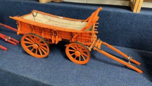 A scratch built model of a Northampton Wagon, painted in orange and black, approx 70c, long in