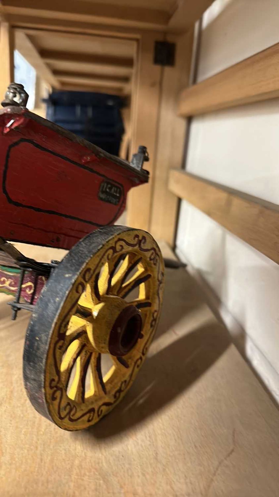 A scratch built model of a small single axle cart, painted in red and yellow, approx 34cm long - Image 5 of 5