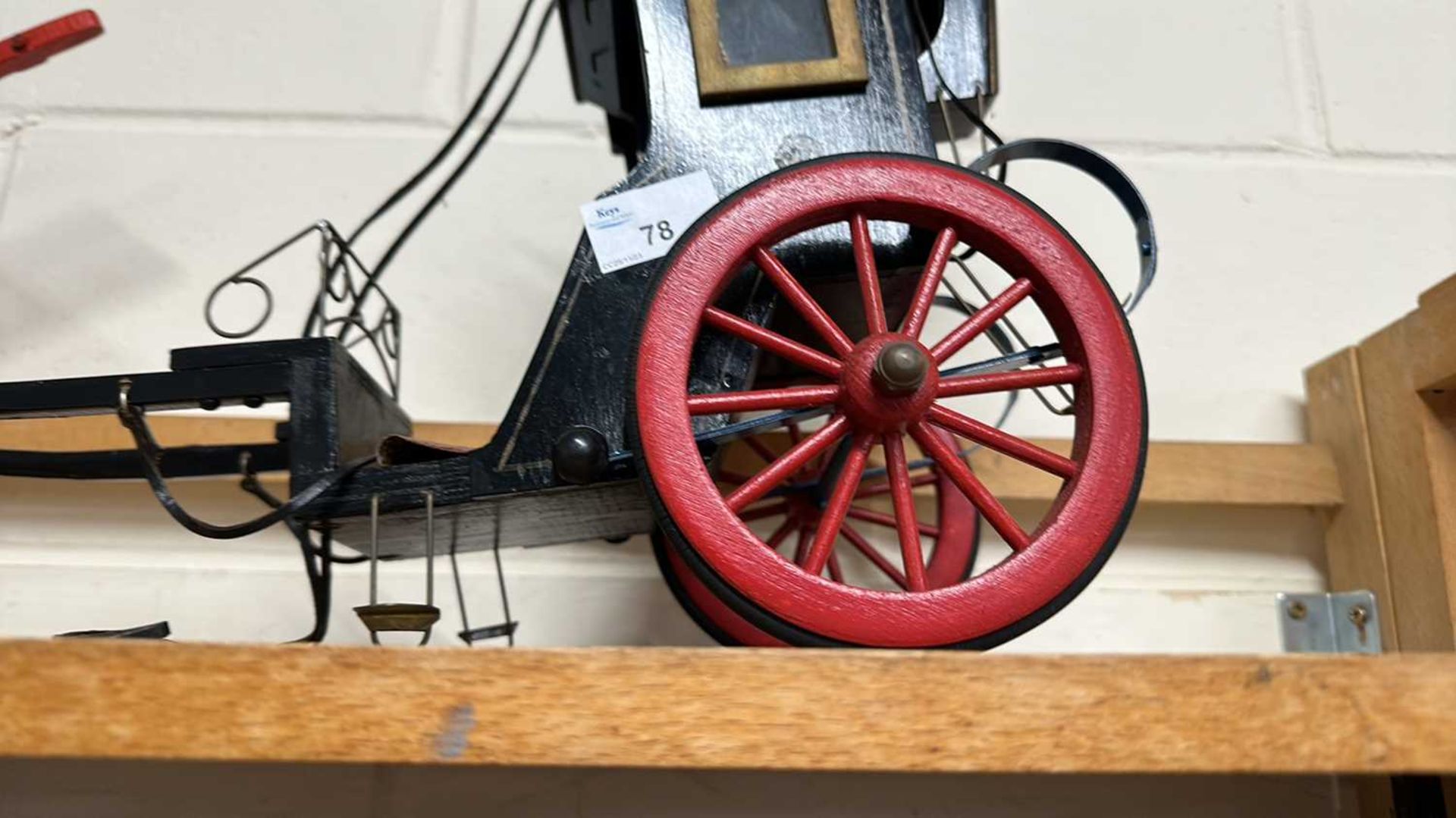 A scratch built model of a Victorian carriage painted in black with red wheels together with a - Image 3 of 9