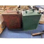 Two vintage petrol cans marked 'Motor Spirit BP' and 'Shell Motor Spirit'