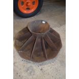 A cast iron pig feeder