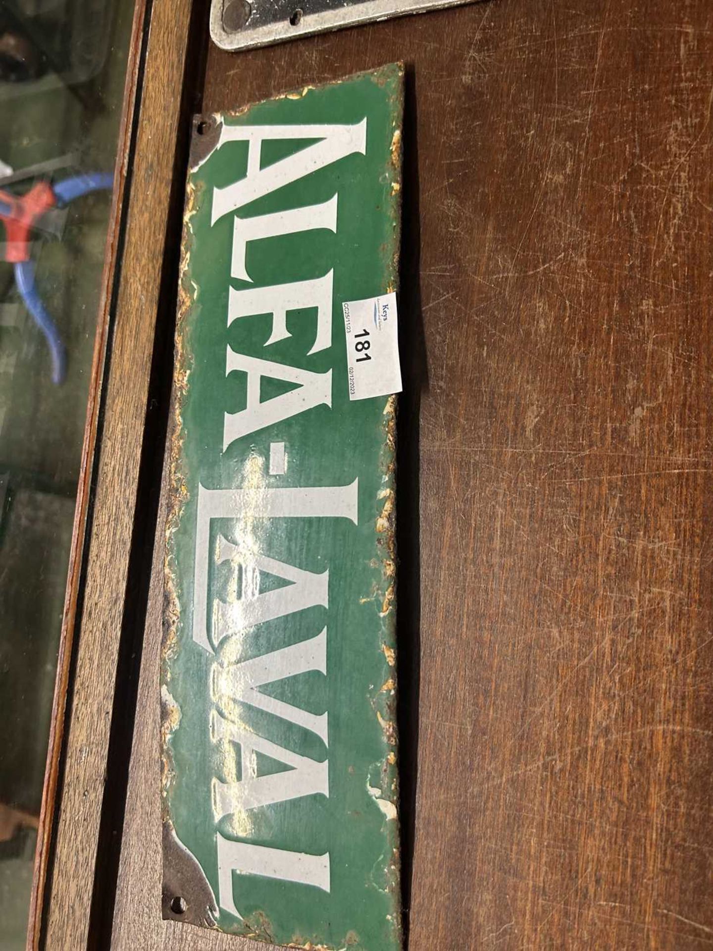 Small enamel sign marked 'Alfa-laval', 34cm wide