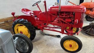 A Massey vintage Tractor, in fully restored condition, reported running by vendor when placed into