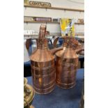 A pair of large copper single handled jugs, probably reproductions