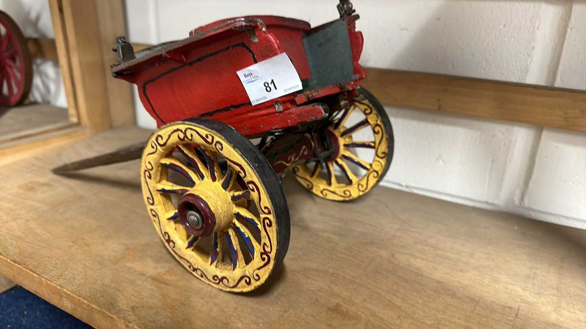 A scratch built model of a small single axle cart, painted in red and yellow, approx 34cm long - Image 3 of 5