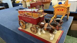 A scratch built model of a brewery dray marked Courage together with two porcelain dray horses