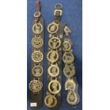 Three straps of various horse brasses