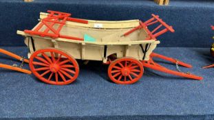 A scratch built model of an Essex Wagon painted in red and beige, approx 75cm long