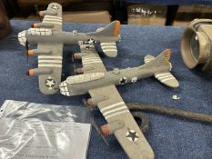 Two prisoner of war carved model aircraft produced by German prisoners of war staying at Saxlingham,