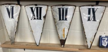 Four enamelled clock number plates: VI, XII, III and IX