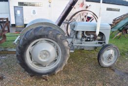 A 1956 four cylinder diesel grey Ferguson, comes with a pick-up hitch, foot plates, trailer