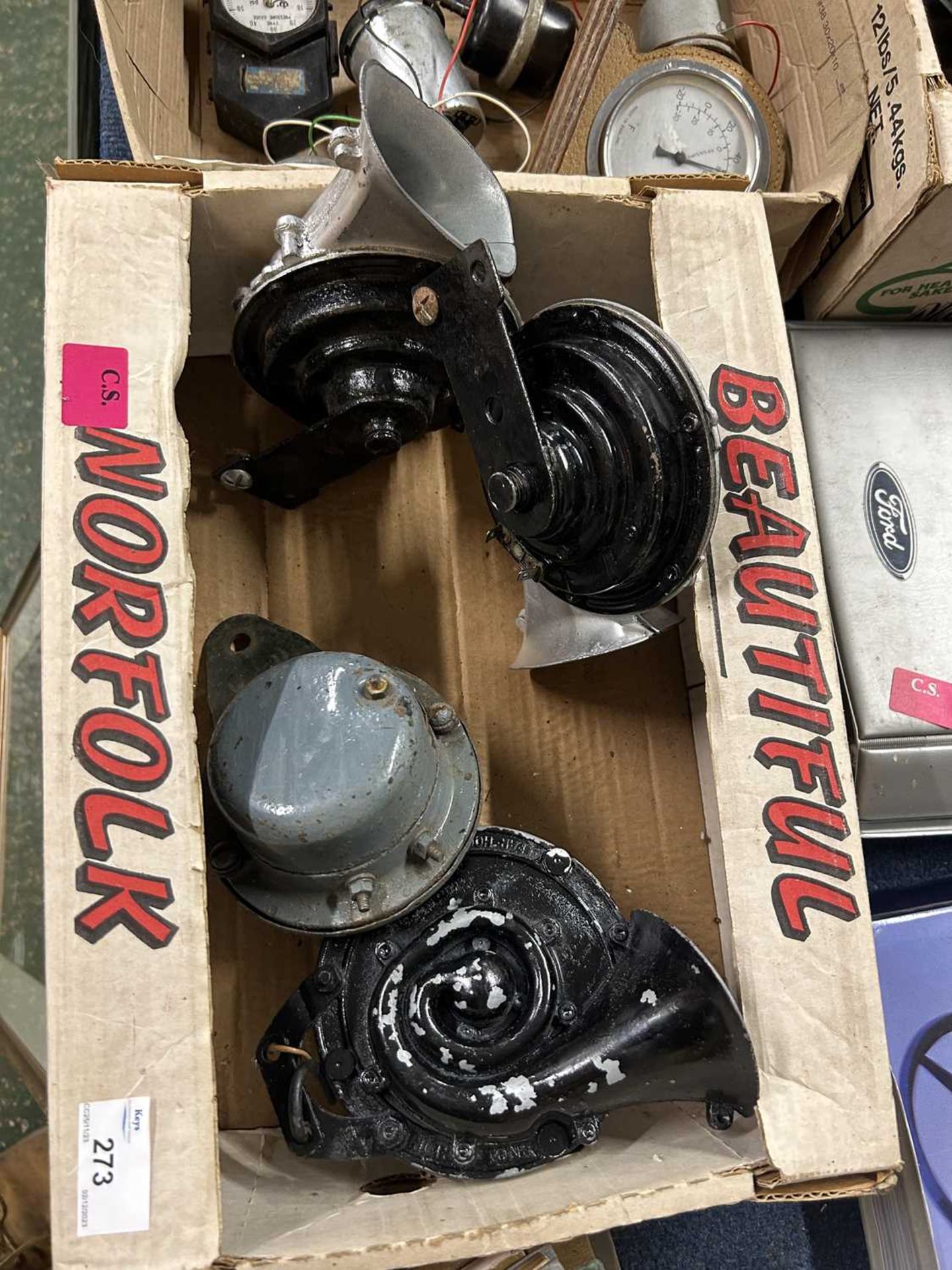 Box of vintage car horns by Clear Hooters and others