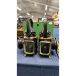 A pair of vintage iron, brass and copper mounted traction engine lamps with bullseye glass and